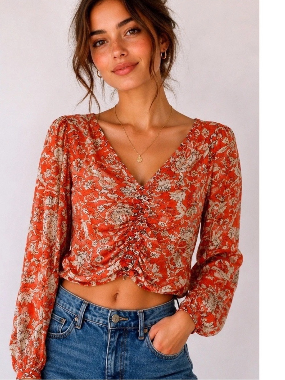 Free People say the word Orange Floral Ruched V-Neck Blouse